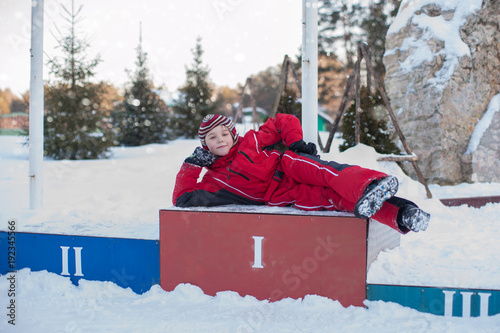 A little boy in red clothes...