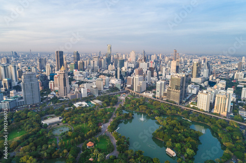 Modern city downtown of Bangkok with green public park