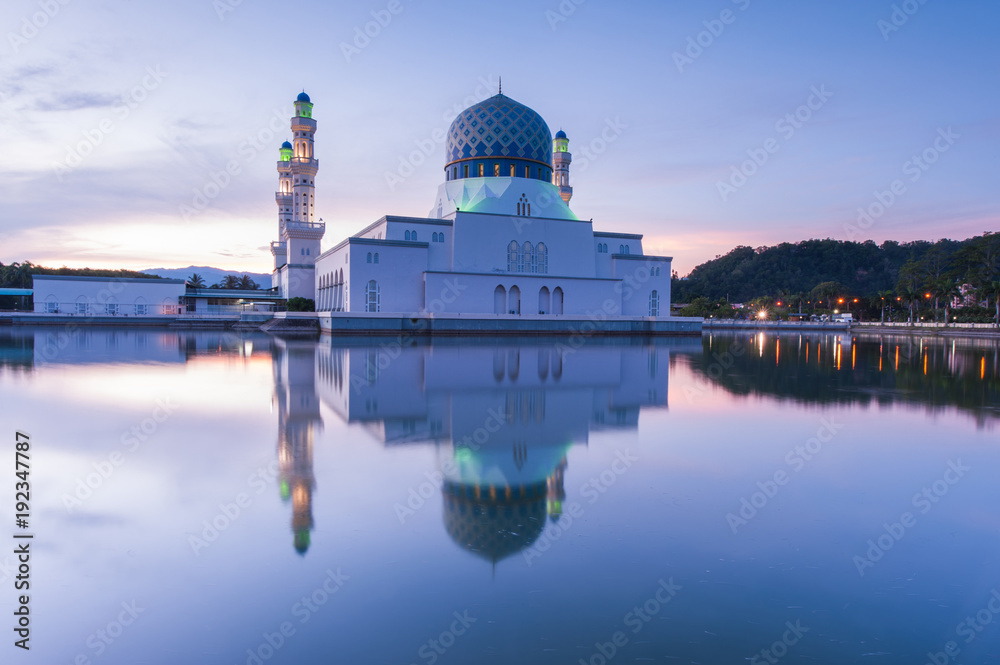 sunrise with reflection at Kota Kinabalu Mosque, Sabah Malaysia.