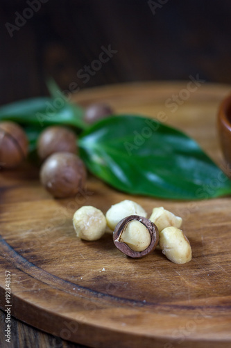 Macadamia nuts on a wooden ...