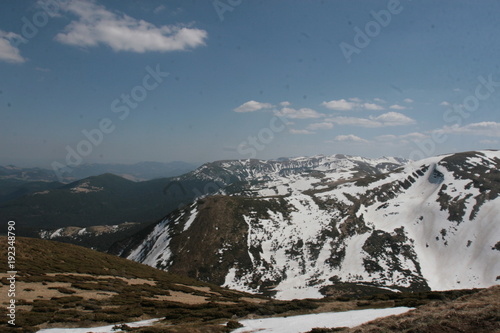 The tops of the mountains with snow in the Carpathians