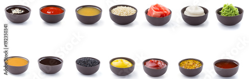 Sauces set in brown bowls isolated on white background.