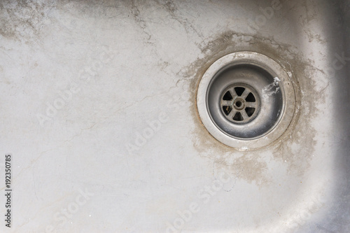 old dirty sink with scrubber inside