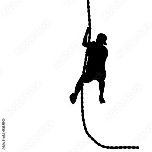 Black silhouette Mountain climber climbing a tightrope up on hands