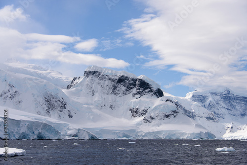 Antarctic landscape with sea and mountains