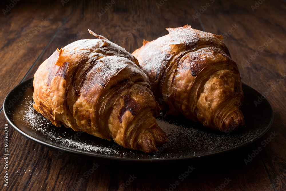 Croissants Sprinkled with Powdered Sugar Croissants Sprinkled with Powdered Sugar