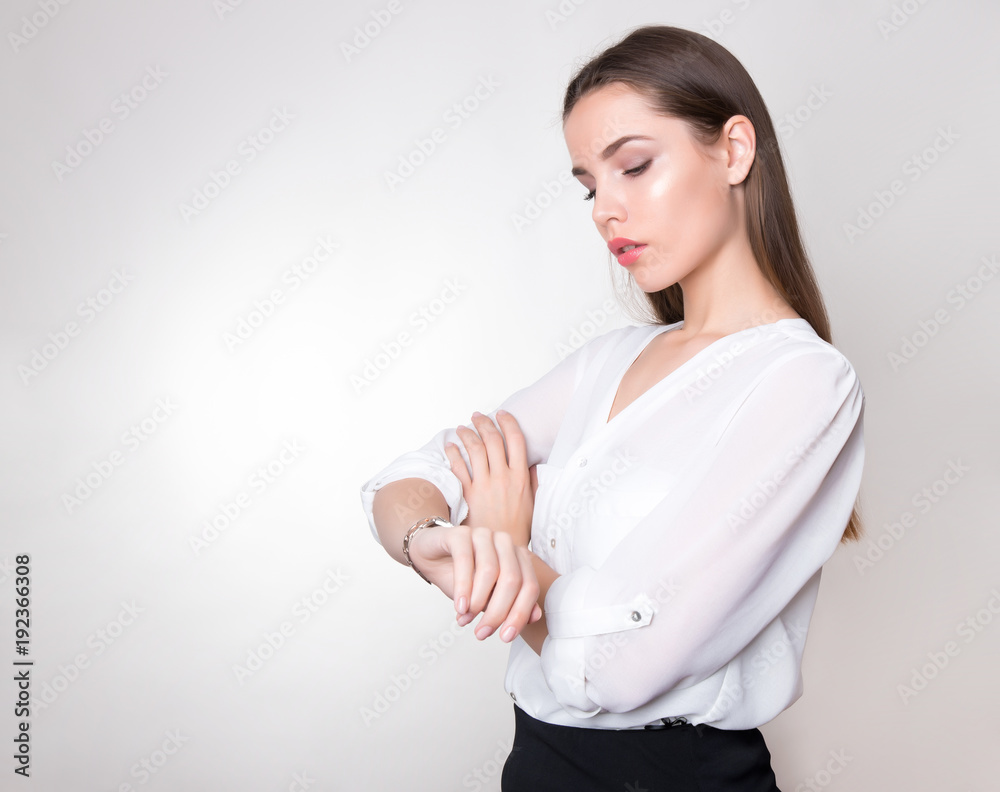 beautiful young woman with long hair wearing wrist watch beautiful young woman with long hair wearing wrist watch