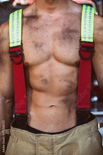 Sexy firefighter muscular body