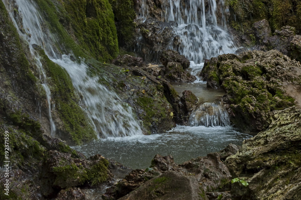 Part of the Krushuna waterfall cascade of river Proinovska near village Krushuna, Bulgaria Part of the Krushuna waterfall cascade of river Proinovska near village Krushuna, Bulgaria