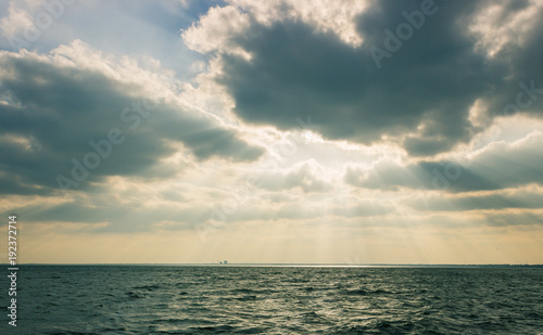 Sunstreaks through clouds over Lake Ray Hubbard in Texas.