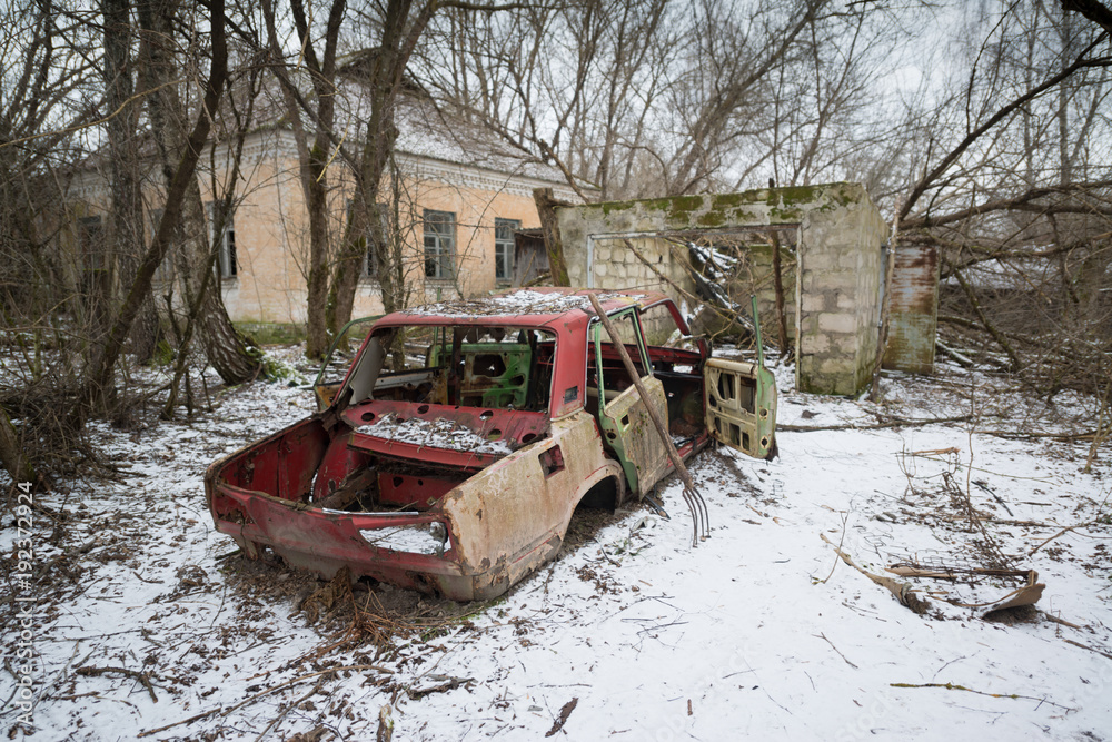 Wrecked car in Chernobyl exclusion zone, Ukraine