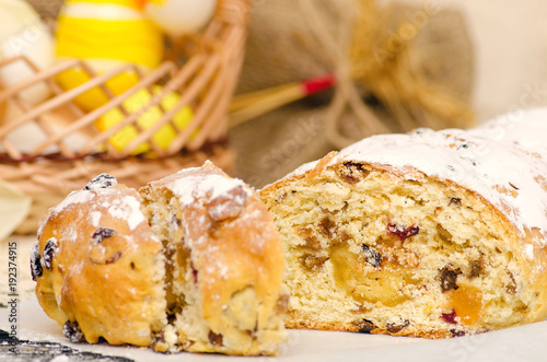 Sweet Easter bread with marzipan, candied fruits, nuts, dried fruits. photo