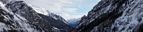 Panoramic beautiful Misty mountains with foggy sunshine blue sky in morning at Alpes in Italy