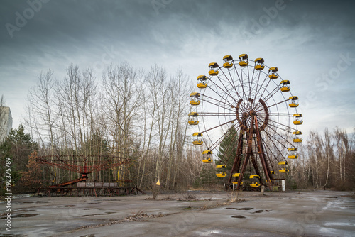 Ferris wheel in abandoned amusement park in Chernobyl exclusion zone, Pripyat, Ukraine photo