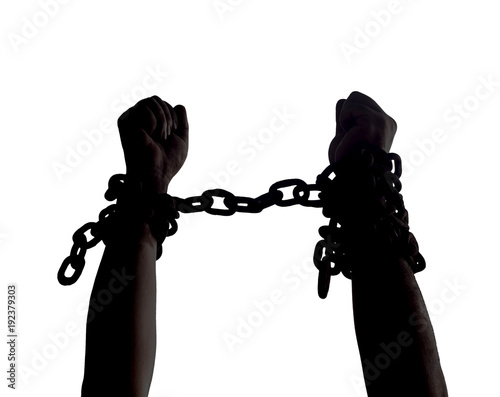 International human rights day concept: Hands in chains isolated on white background photo