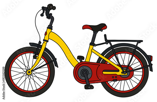 Fototapeta Naklejka Na Ścianę i Meble -  The funny red and yellow bicycle