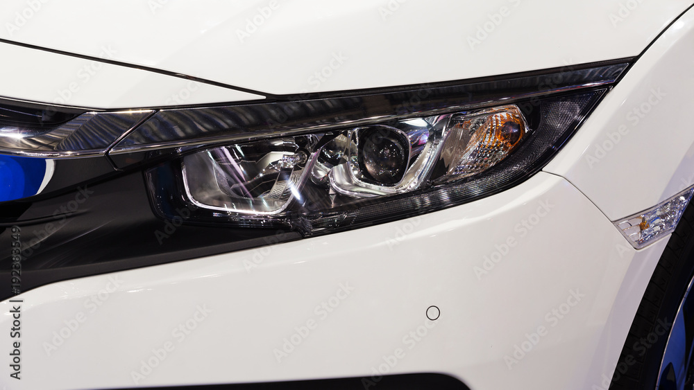 stylish modern car headlight close up