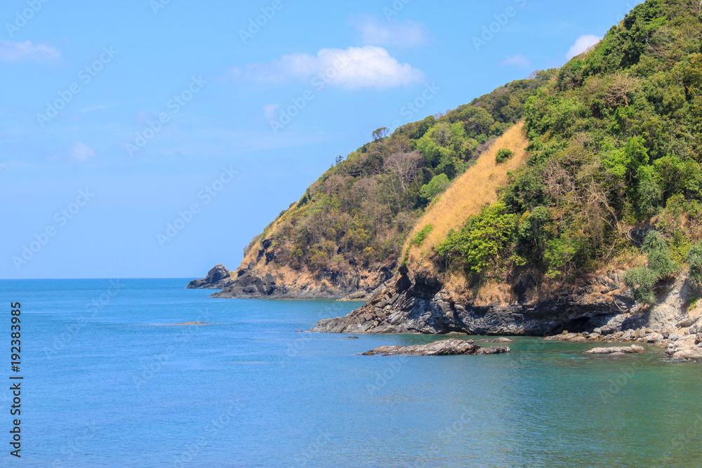 Coast with cliffs and woodlands at Thailand