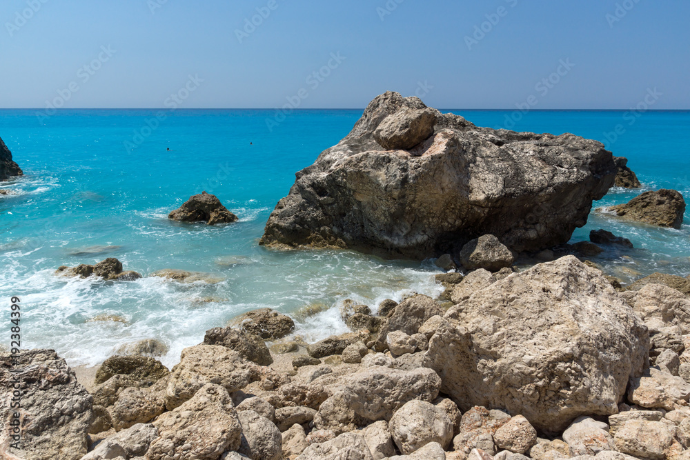 Amazing landscape of blue waters of Megali Petra Beach, Lefkada, Ionian Islands, Greece Amazing landscape of blue waters of Megali Petra Beach, Lefkada, Ionian Islands, Greece