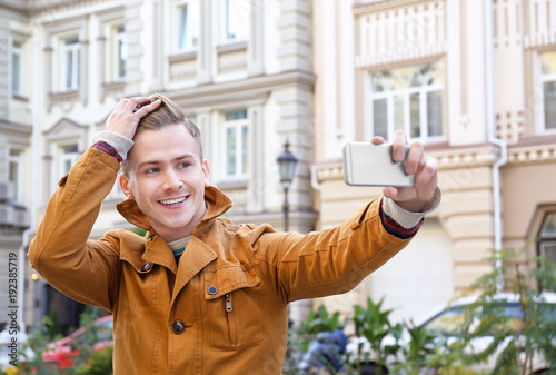 Young handsome man taking s...