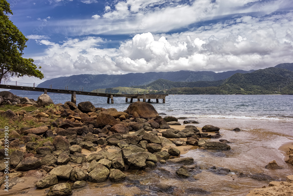 Pier on Sorceress Beach, Praia da Feiticeira, in Ilhabela - Sao Paulo, Brazil