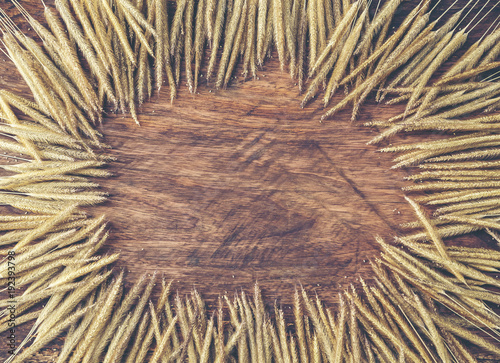 Dry flower frame on wood ba...