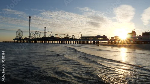 Sunset Behind the Galveston Pier Silhouette Beach Ocean Blue Wave