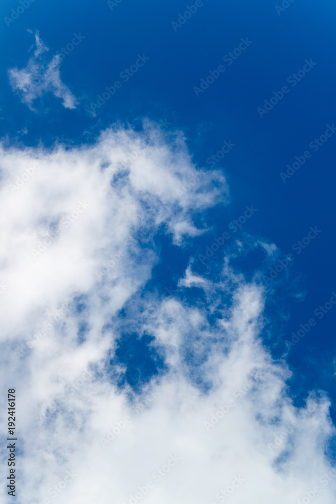 Deep blue sky with white cloud background Deep blue sky with white cloud background