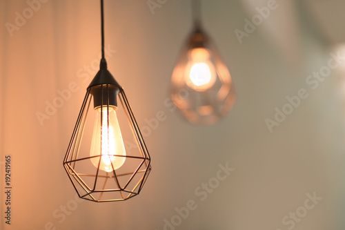 Elegant lamp on blurred background