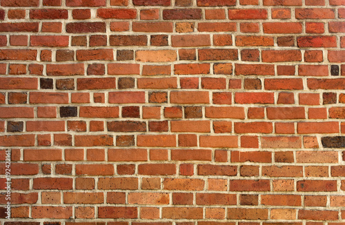 Background of red and brown bricks wall texture