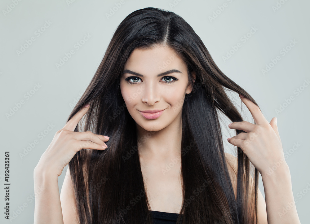 Pretty Young Model Woman with Long Silky Hair and Natural Makeup, Hair care Concept Pretty Young Model Woman with Long Silky Hair and Natural Makeup, Hair care Concept
