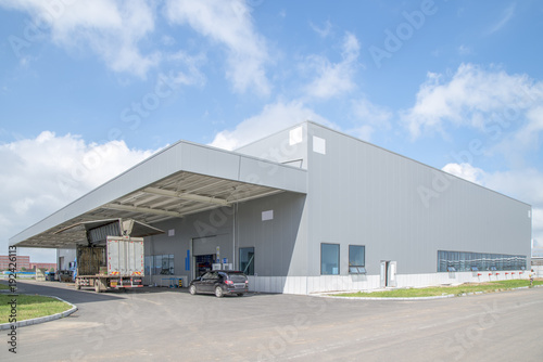 Obraz na plátně Modern factory buildings and warehouses