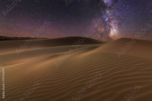 Amazing views of the Sahara desert under the night starry sky. © Anton Petrus