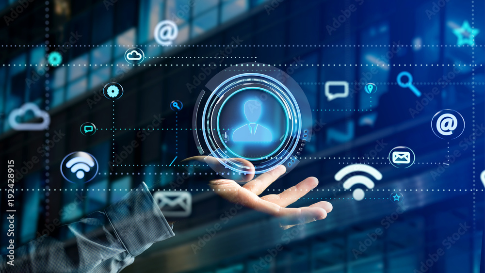 Businessman holding a Contact icon surrounding by app and social icon - 3d render Businessman holding a Contact icon surrounding by app and social icon - 3d render