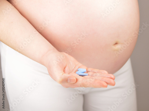  pill in his hand