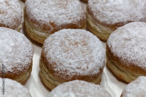 Krapfen covered with powdered sugar