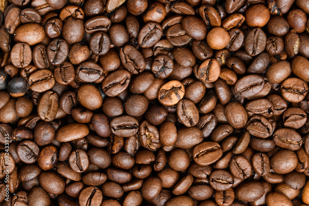 Roasted coffee beans, can be used as a background. Coffee beans texture macro Roasted coffee beans, can be used as a background. Coffee beans texture macro