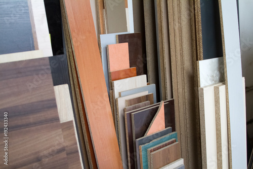 A pack of parts of a particleboard in the furniture manufacturing.