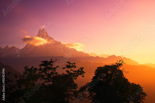 Scenic landscape with mountain peak Machapuchare, Nepal on sunrise.
