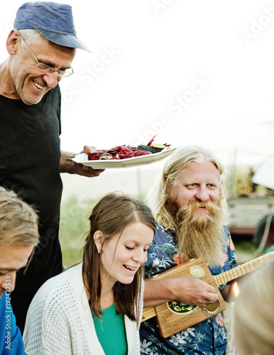 Family eating together in Friseboda, Sweden photo