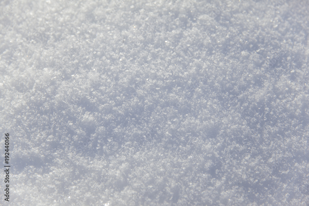 winter background with snow texture closeup