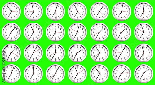 many clocks, time to wake up for breakfast, modern white metallic alarm clock on chroma key green screen background, concept of time