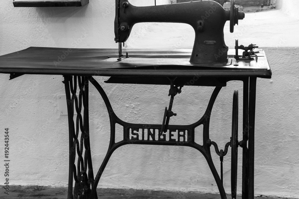 An antique manual "Singer" treadle sewing machine Stock Photo | Adobe Stock
