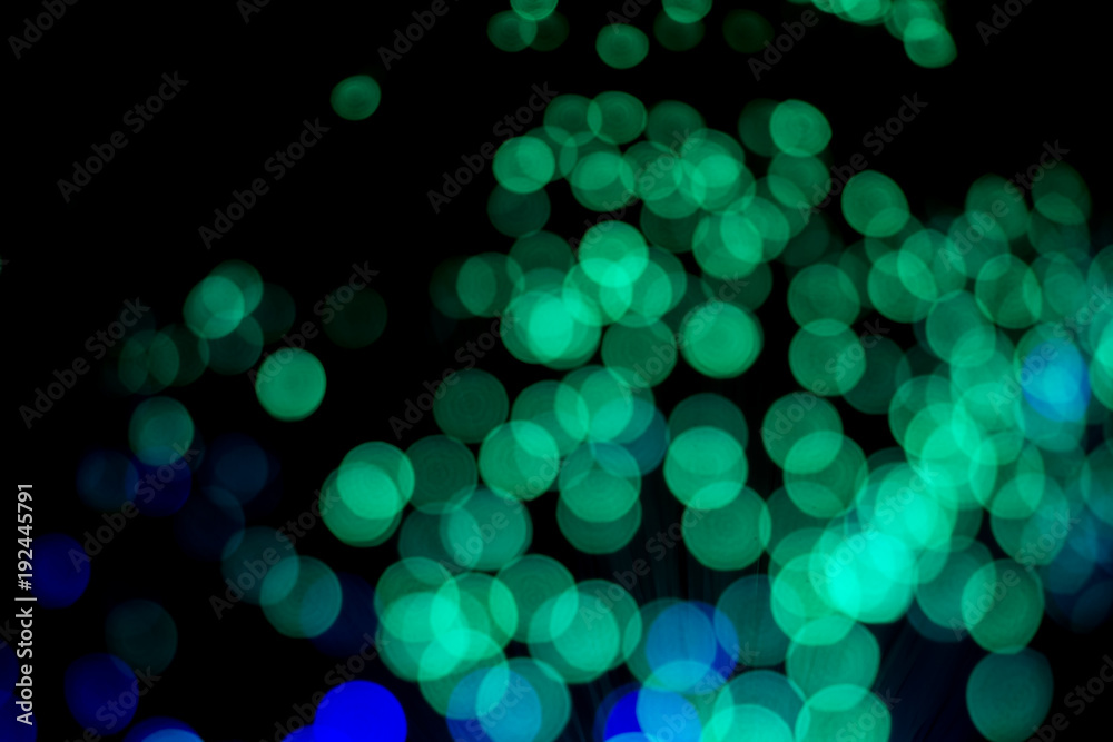 Abstract background with bright colorful dots of light, soft bokeh Abstract background with bright colorful dots of light, soft bokeh