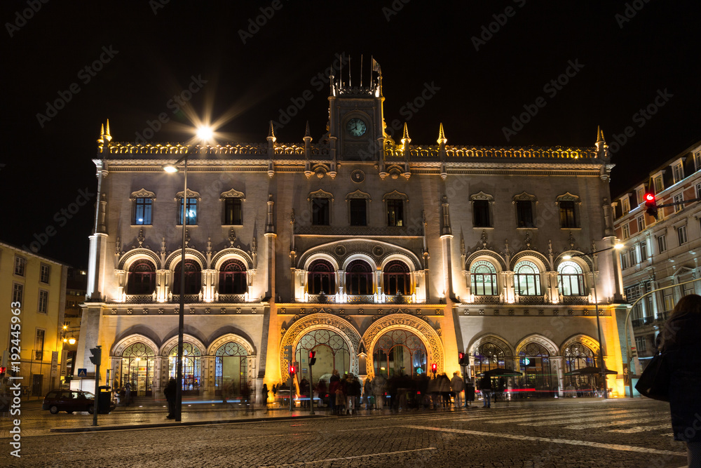 Lisbon (Portugal) - Evening lights on the Rossio central station