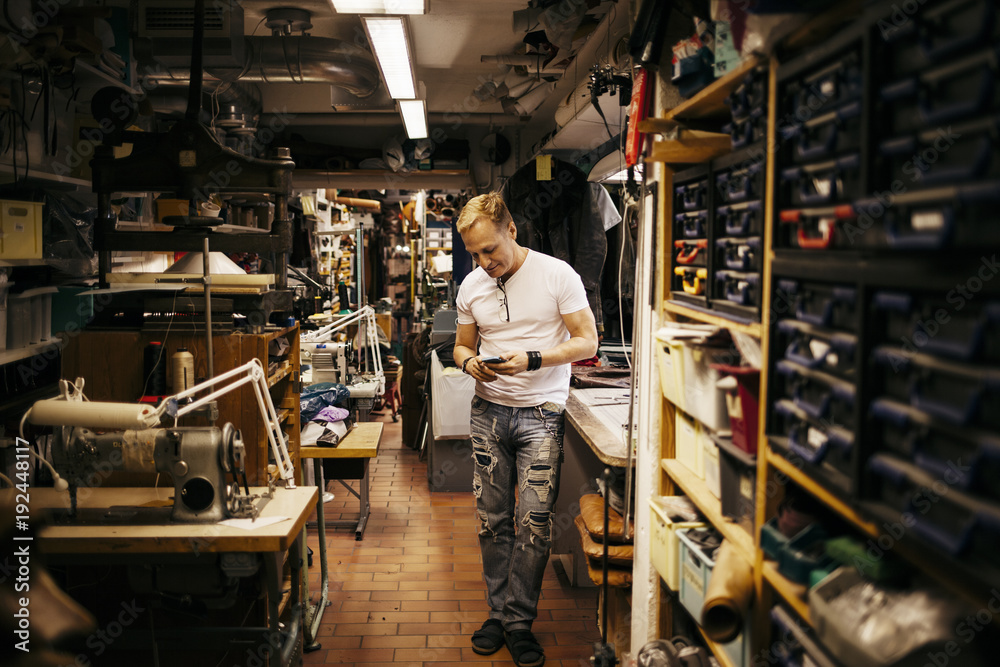 Man in leather workshop Man in leather workshop