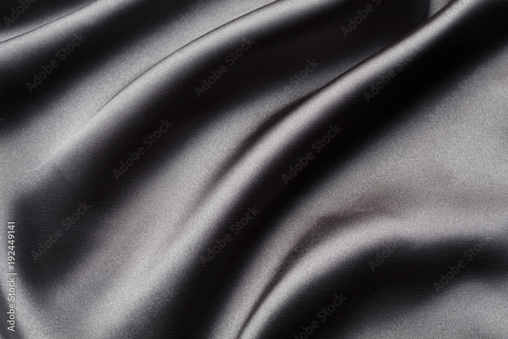 Fototapeta premium Abstract, elegant background texture with waves of silk, satin luxury cloth fabric