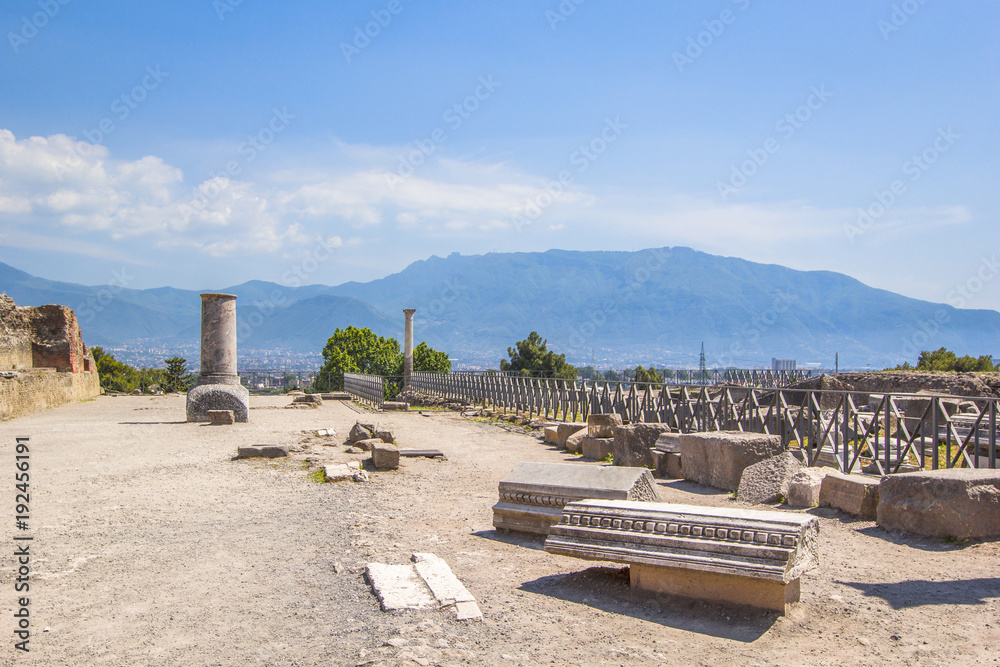 Panoramic view of the ancient city, the ruined ancient columns and the volcano Vesuvius, Pompeii (Scavi di Pompei), Naples, Italy.