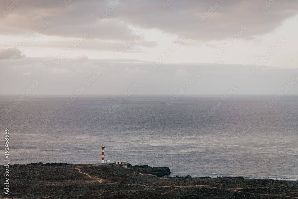 Lighthouse on the shore of the Atlantic ocean. Tenerife 