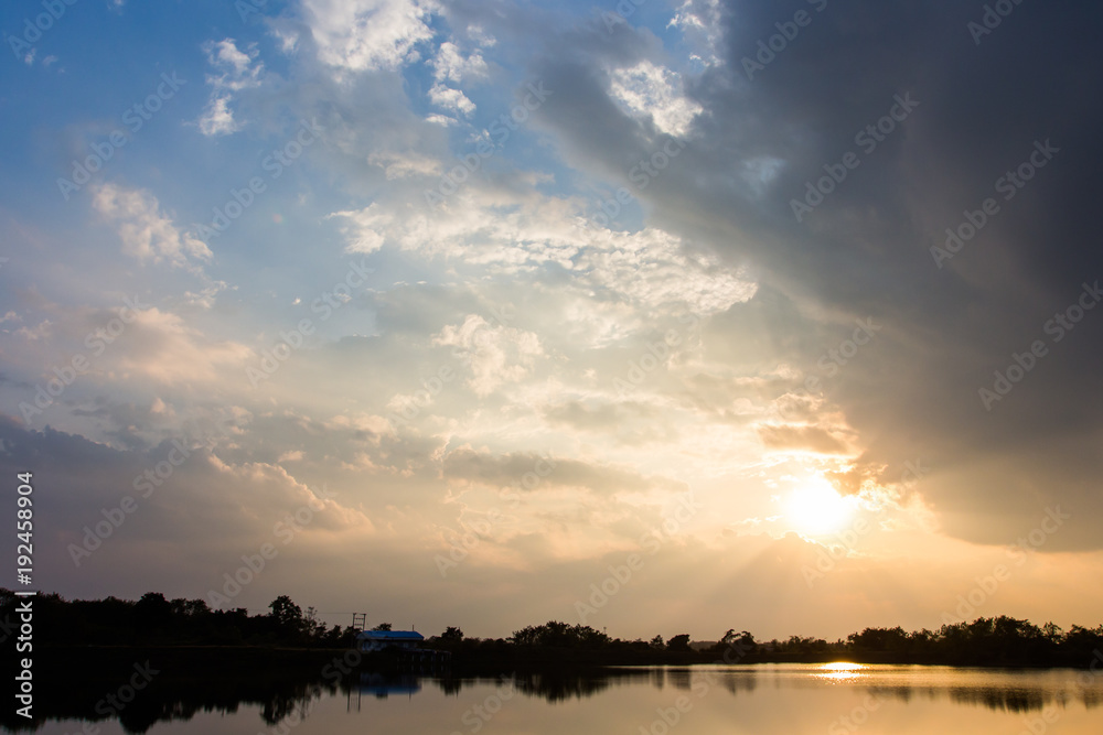 colorful dramatic sky with cloud at sunset.